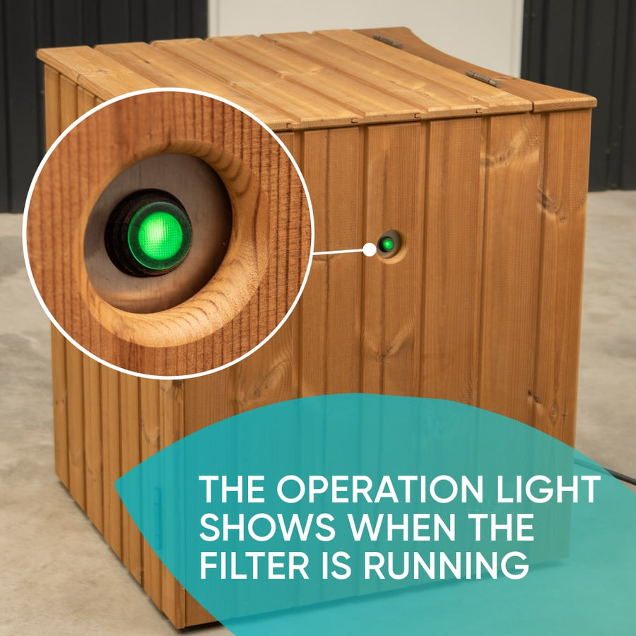 Close-up of wooden premium sand filter box with green operation light indicating filter is running