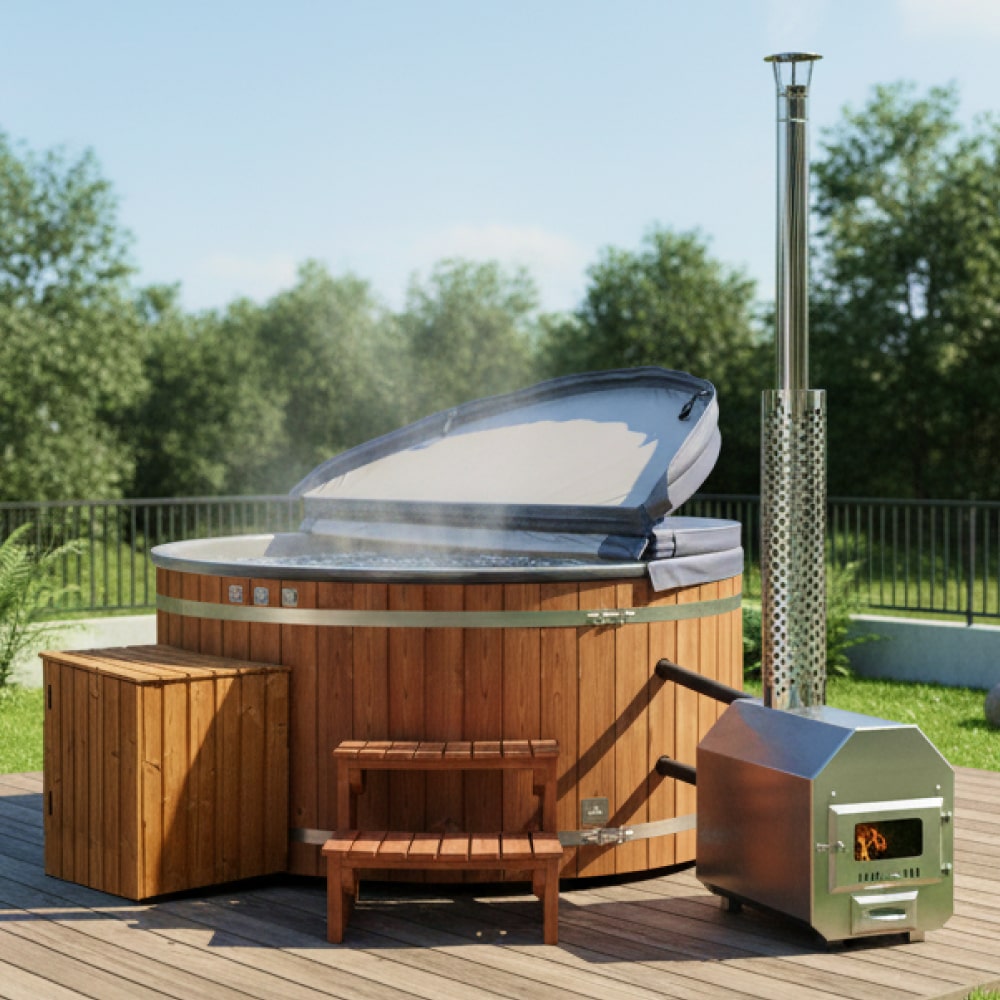 Outdoor view of premium 4-8 seater wood fired hot tub with light stain ThermoWood cladding and external stainless steel stove